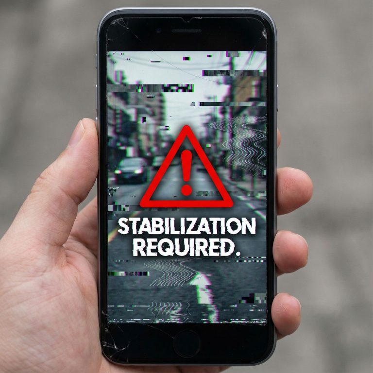 흔들리고 왜곡된 영상과 함께 경고 표시, 안정화 필요라는 문구가 표시된 스마트폰 화면 모습이다.